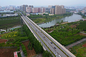 高清晋城市城市建设道路交通高楼水系公园小桥绿地视频素材